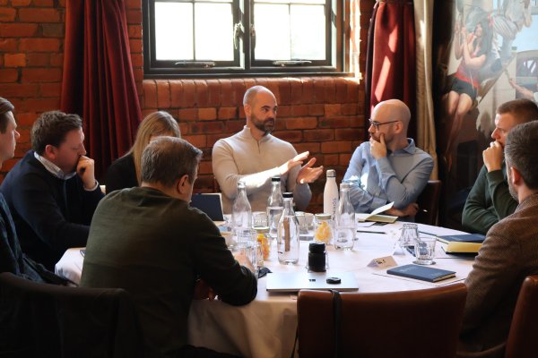 People Speaking in a Roundtable