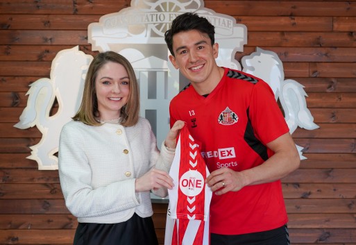 Izy Herrera of Seriös Group and Luke O'Nien of Sunderland AFC