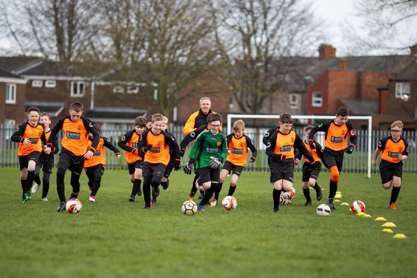 Paul Davison playing football with Washington Juniors FC’s under-13 squad